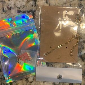 100% authentic Prada beauty charm with ungraded link chain